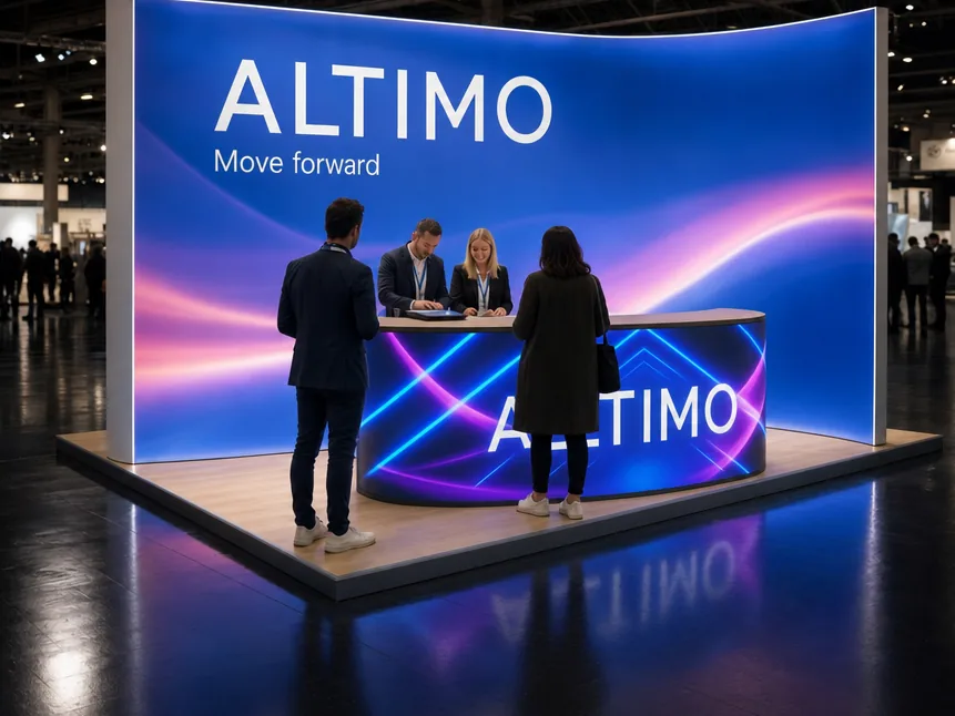 Un stand de salon en cadres lumineux, avec son comptoir d’accueil à écran LED, son plancher et des visiteurs
